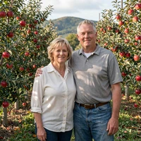 Darlene and Grady, older North Carolina couple engaged in a Hendersonville apple orchard after meeting on a country dating site